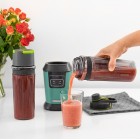 Блендер для смузі Sencor стаціонарний 800Вт, 2 ємності, чаша-600мл, титанові леза, вакуумні кришки, зелений Блендер для смузі Sencor стаціонарний 800Вт, 2 ємності, чаша-600мл, титанові леза, вакуумні кришки, зелений